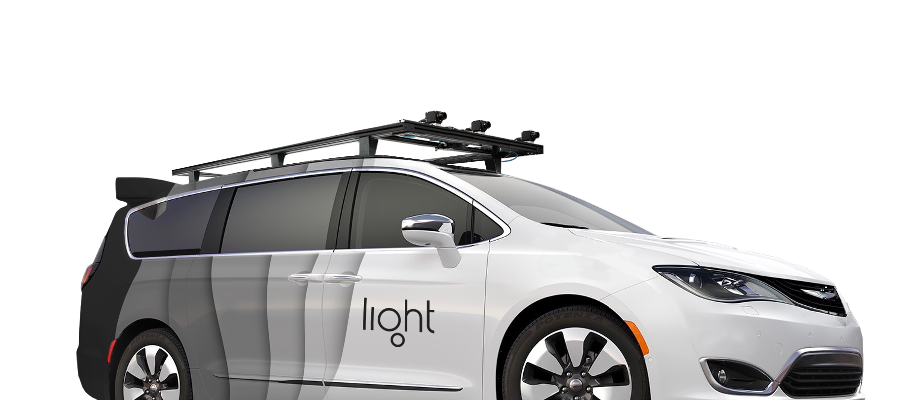 Autonomous mini van with Light logo on the side